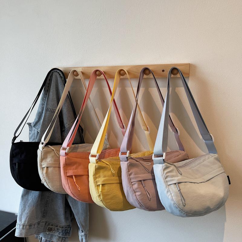 Korean Version of Casual Small Bag Women's 2025 New Nylon Cloth Dumpling Bag Wide Shoulder Strap Single Shoulder Messenger Bag One Piece Delivery