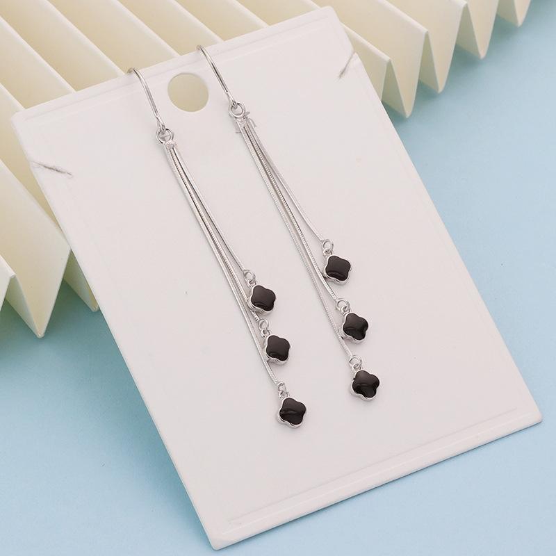 Brincos femininos trevo de quatro folhas, borla longa, brincos pendentes leves e luxuosos, premium