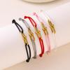Verstellbares Kreuzgewebtes Armband mit Edelstahl-Hufeisen-Schnalle - Vielseitiger und Freundlicher Geschenkschmuck.