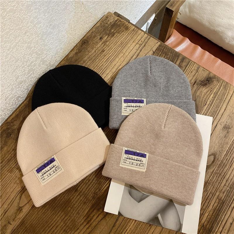 Autumn and winter hat women's wool hat handmade letter labeling white bucket hat winter knitted cold hat couple tide