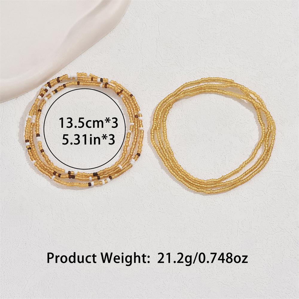 Mehrschichtige Reiskorn-Fußkettchen in Goldfarbe für Damen 2 Stück/Set Böhmische Fußketten Knöchelarmband Strand Schmuck Sommer Accessoires