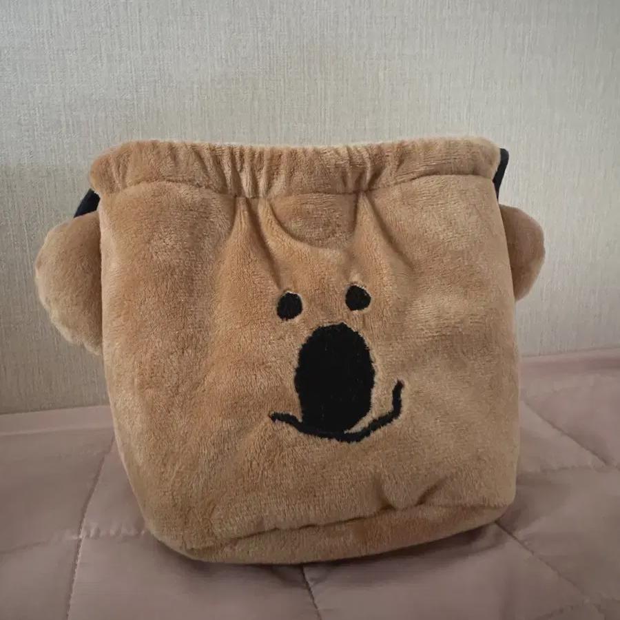 

Dinotin Quoca Pouch