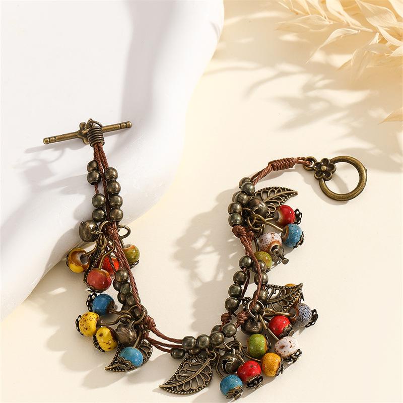 Retro Bohemian Literary Small and Fresh Cherry Bead String Fringed Bracelet, Rare and High-end Fashionable Ethnic Accessory.