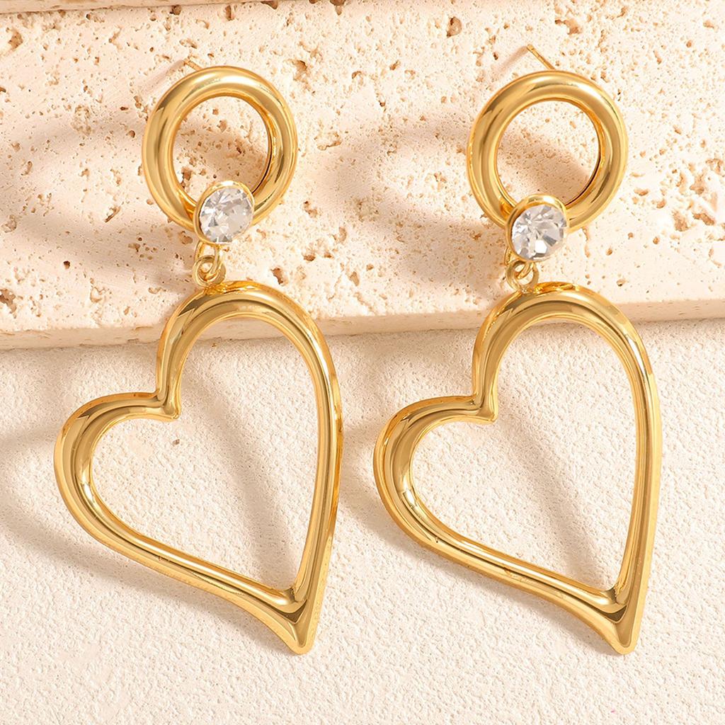 New heart-shaped minimalist hollowed-out earrings, pendants, round alloy stud earrings, light luxury style earrings and earrings