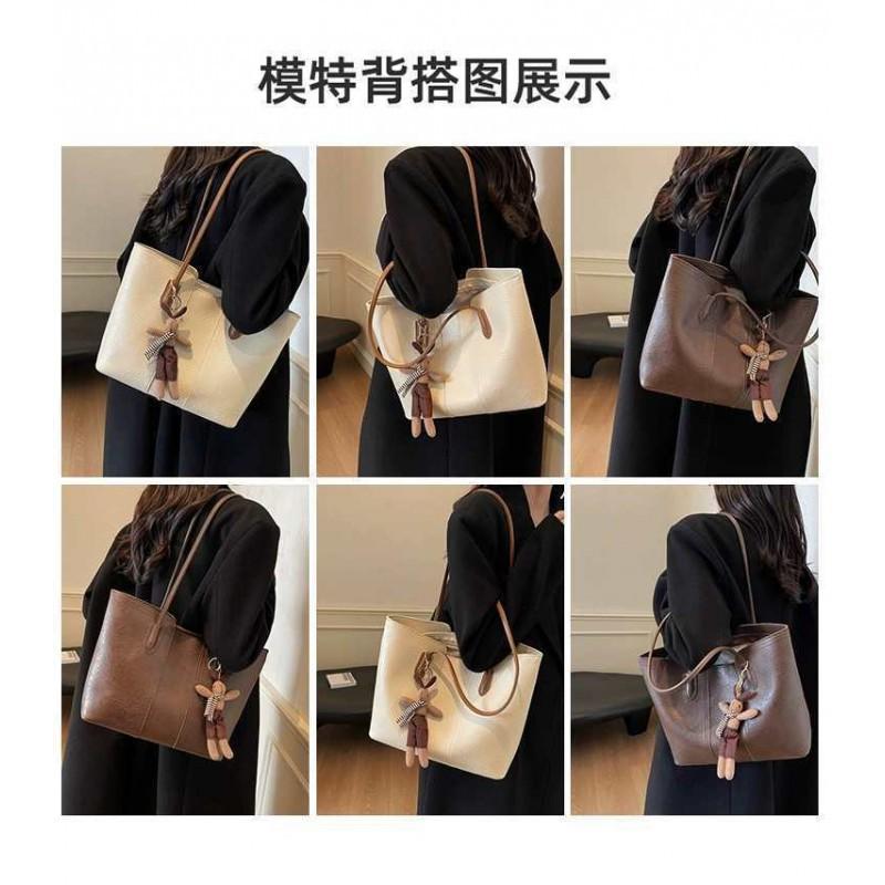 Hochwertige Retro-Tasche mit großem Fassungsvermögen, modische Damen-Umhängetasche für Pendler, beliebte Tragetasche