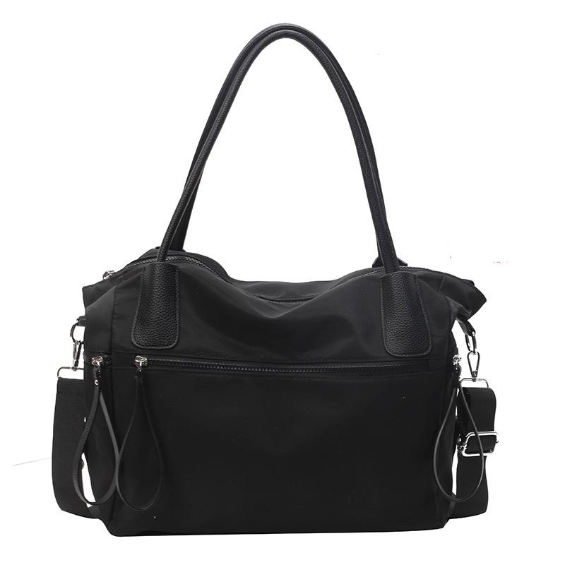 Travel bag large capacity high sense high value Korean fashion niche shoulder handbag business travel fitness duffel bag
