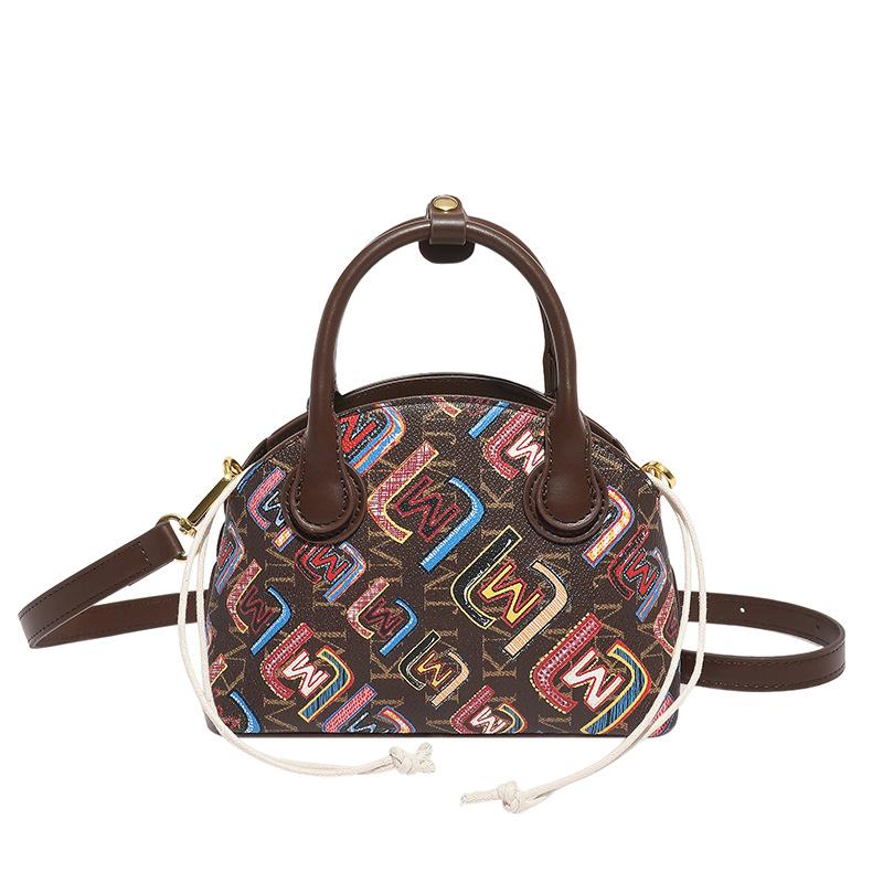 

Korean version of Chaoshi women s spring and summer messenger bag handbag temperament women s bag shoulder bag versatile women s new big bag