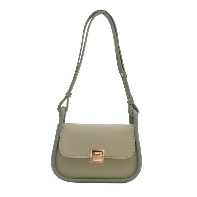 

Contrasting color saddle bag women s crossbody texture niche women s bag 2024 spring new lock shoulder armpit bag зелений