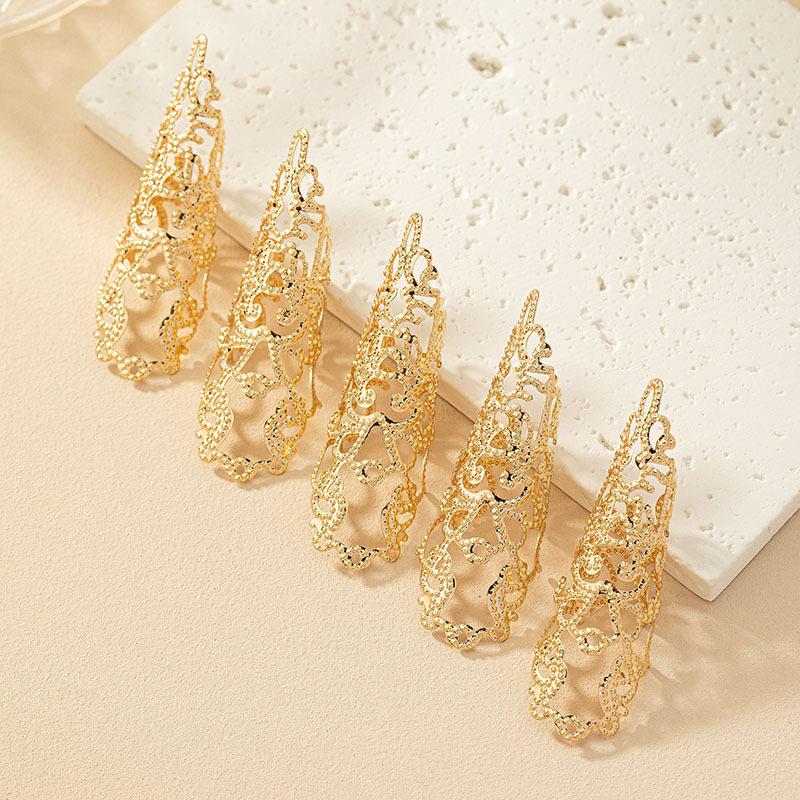 

5PCS Punk Gothic Exaggerated Armor Hollow Pattern Knuckle Protective Cover Ring Dance Performance Ring Set золотий