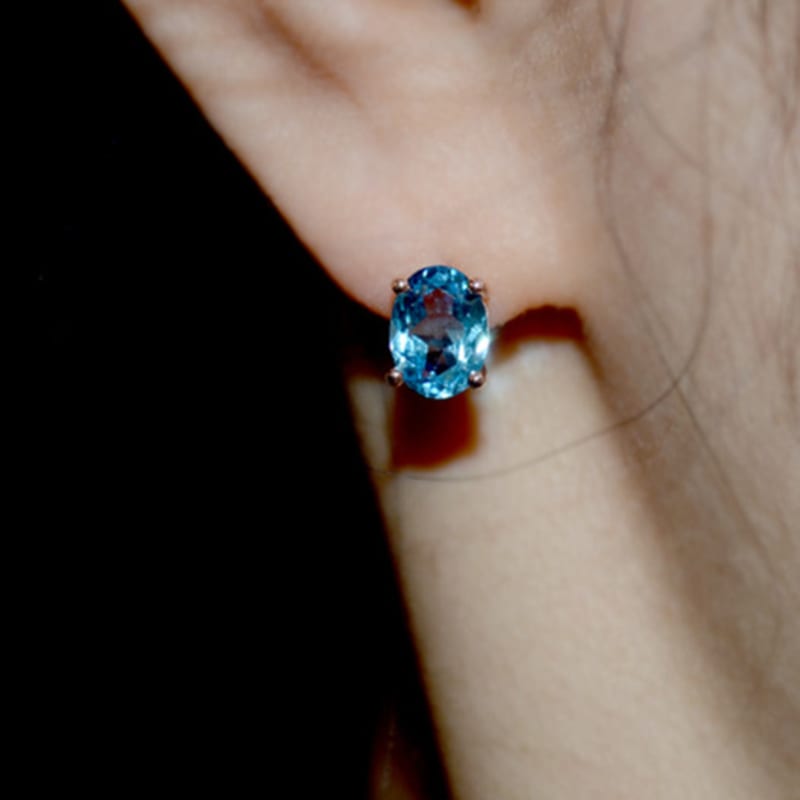 

martha in the garret jutie.swissblue topaz Rose gold plating