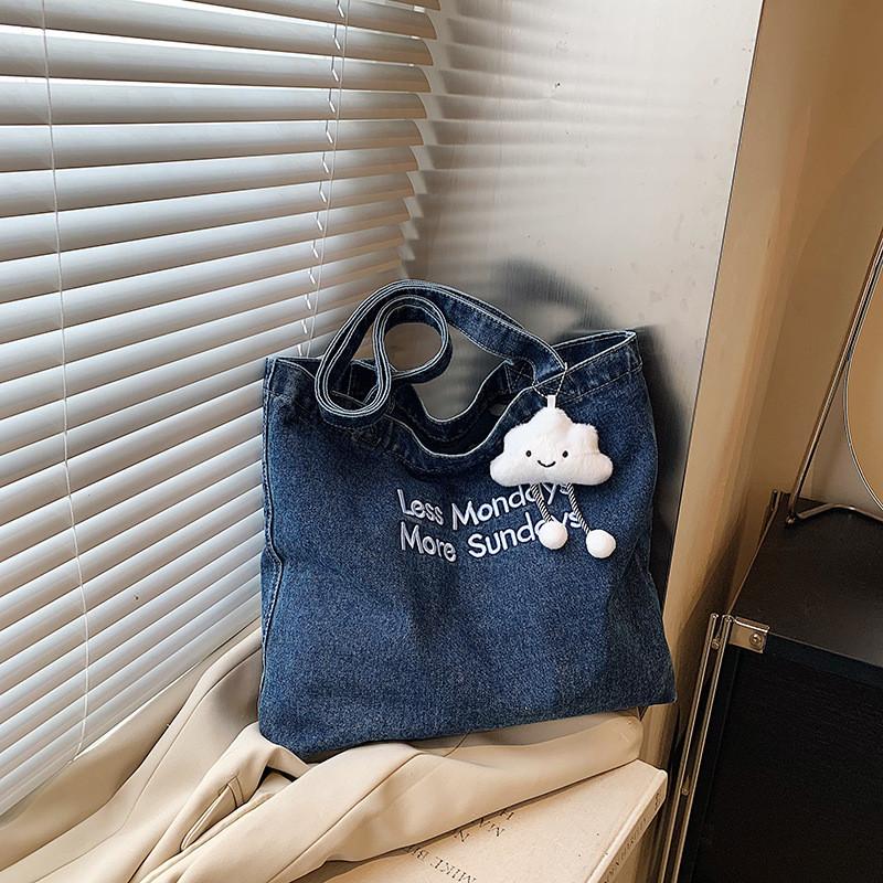 Fashionable Medium Sized Denim Tote Bag With Unique Stitching Details For Everyday Use