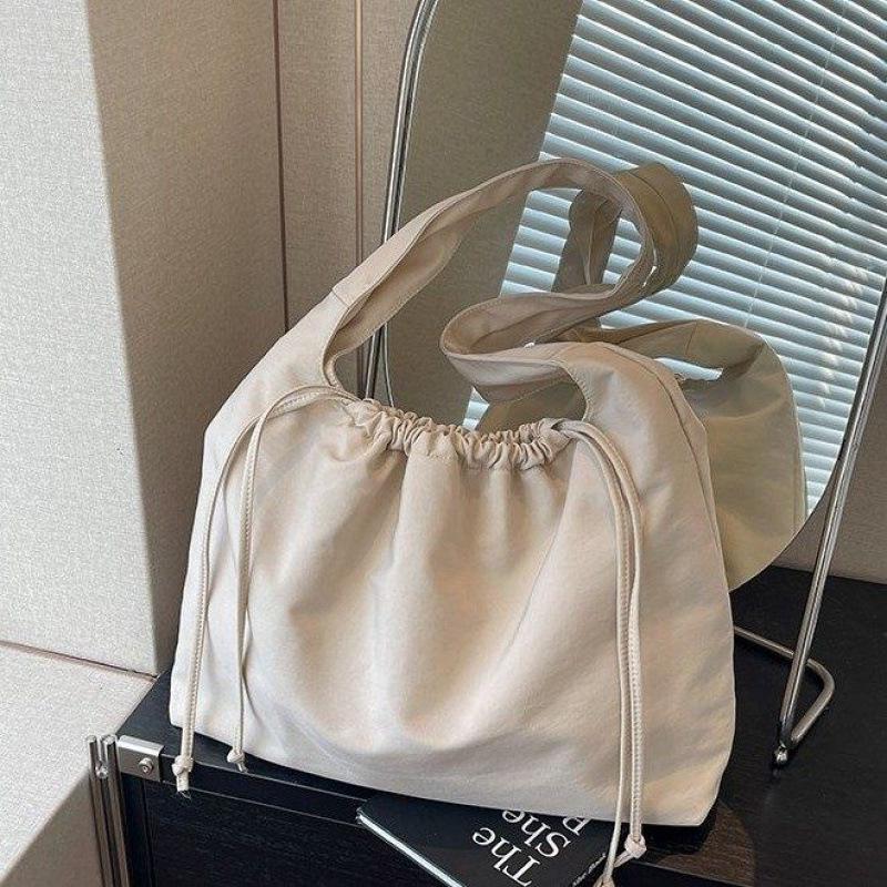 

Модная сумка-тоут большой вместимости для поездок на работу 2025: Сумка-мешок на шнурке для офиса и повседневного использования бежевый