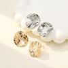 Irregular Crushed Ice Metal Stud Earrings: Luxurious French Design for Women.
