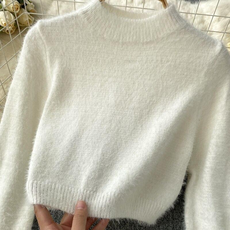 Autumn And Winter Fashion Short Long-Sleeved Knitted Sweater + Hip Short Skirt Two-Piece Set