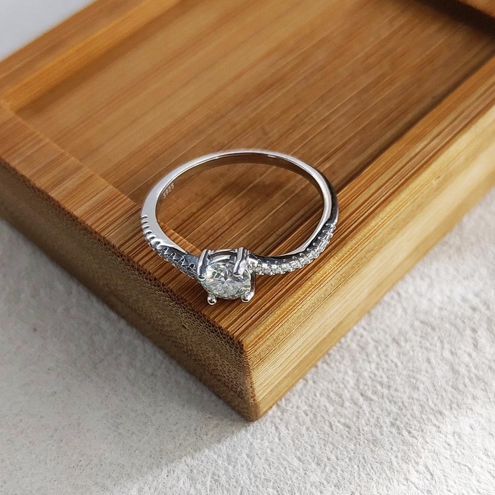 S925 Sterling Silver 50-Point Twisted Moissanite Ring with Four-Prong Setting