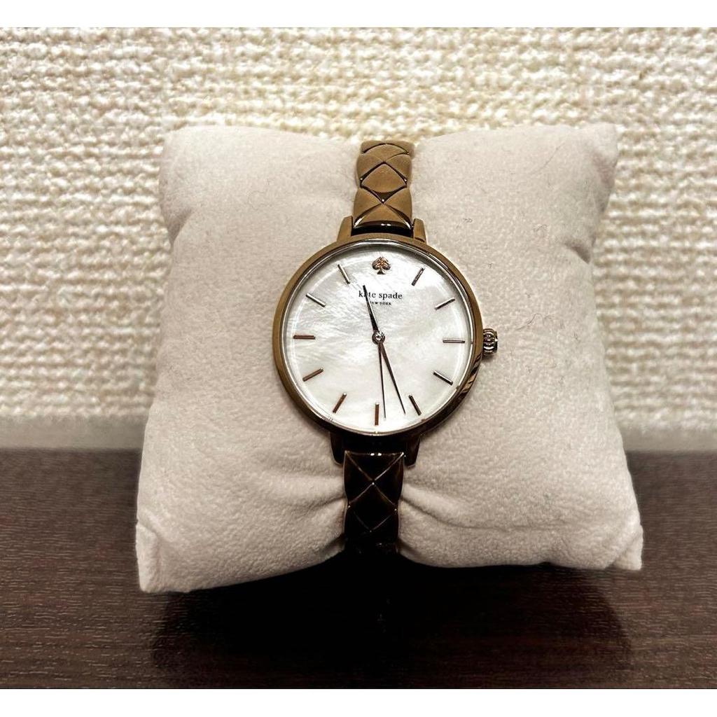 Used Beautiful condition Kate Spade watch, shell dial, gold, battery dead