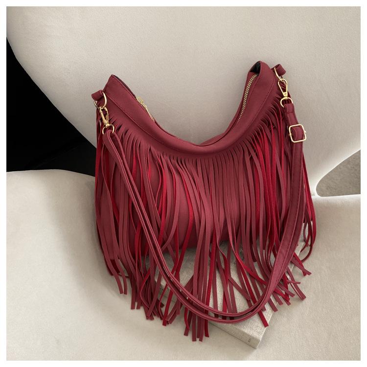 Fashionable And Casual Commuting Tassel Hand-held Shoulder Tote Bucket Bag High-Looking Personalized Women's Bag