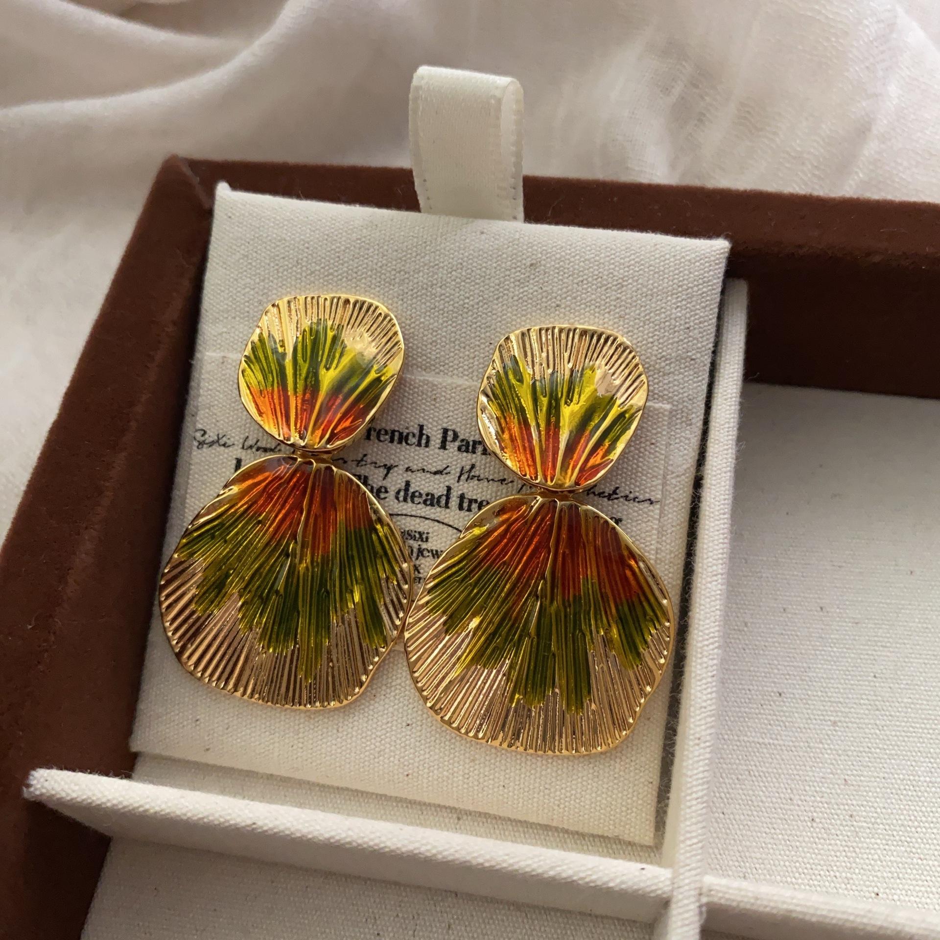

European and American gold geometric retro exaggerated women s earrings niche design high-grade metal versatile cold wind temperament earrings