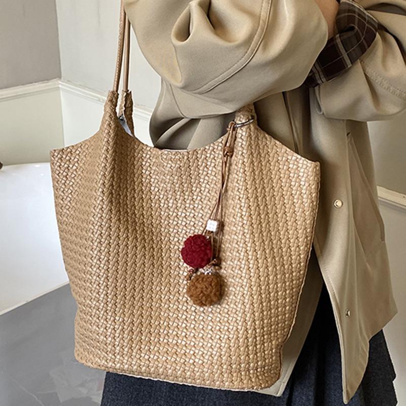 Autumn new texture braided pattern commuting simple large capacity retro solid color bucket armpit shoulder bag for women