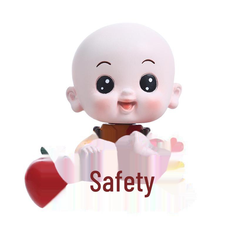 Creative Little Monk Maitreya Buddha Car Ornament: Cute, Shaking Head Resin Doll for Car Interior Decoration and Safety.