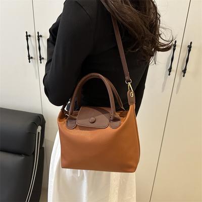 Damen-Beuteltasche 2025 Frühjahrsexplosion hochwertige Umhängetasche modische Patchwork-Kontrastfarben-Umhängetasche High-End-Damentasche