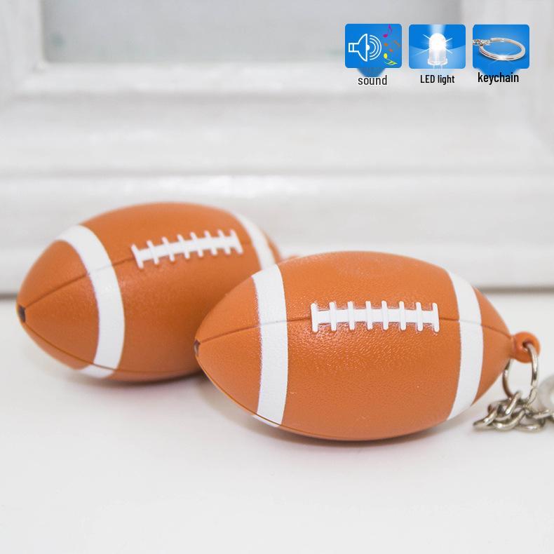 Cartoon Mini Rugby LED Licht Klingender Schlüsselanhänger Zubehör