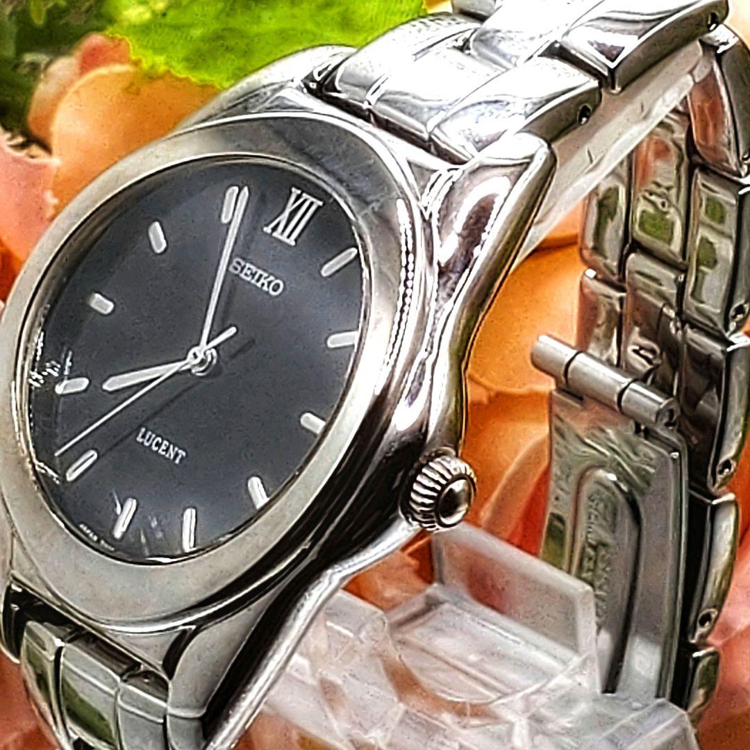 

[USED] Seiko Lucent watch with black box, instruction manual, and links.