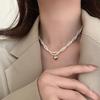 Millet glass pearl twist love high sense niche light luxury women's new collarbone chain Internet celebrity explosion necklace jewelry