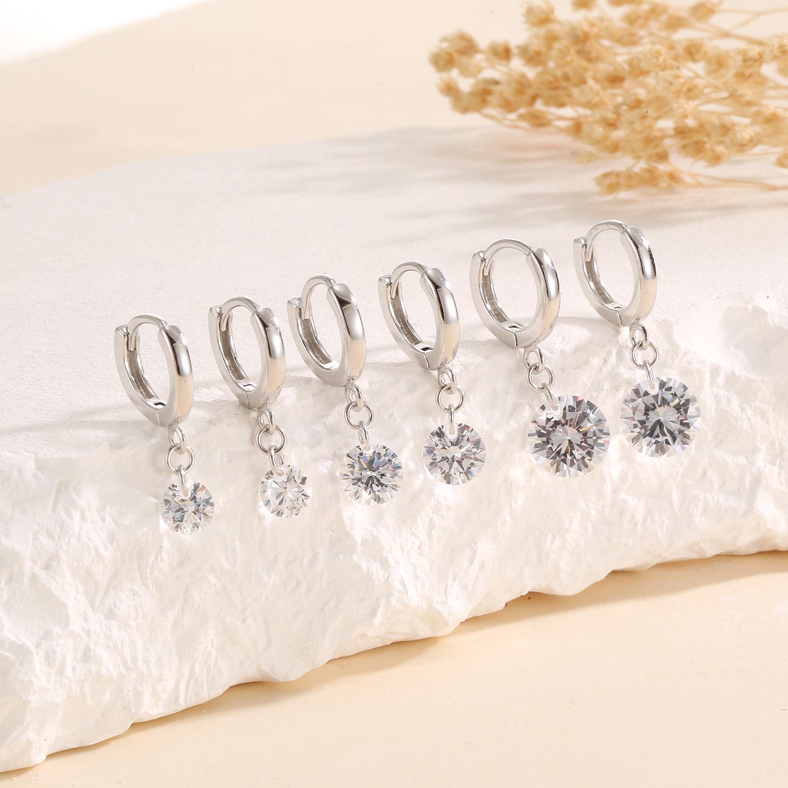 Beixi S925 Sterling Silver Water Drop Dangle Earrings with Zircon Sparkle and Single Diamond Design. s925 Silver