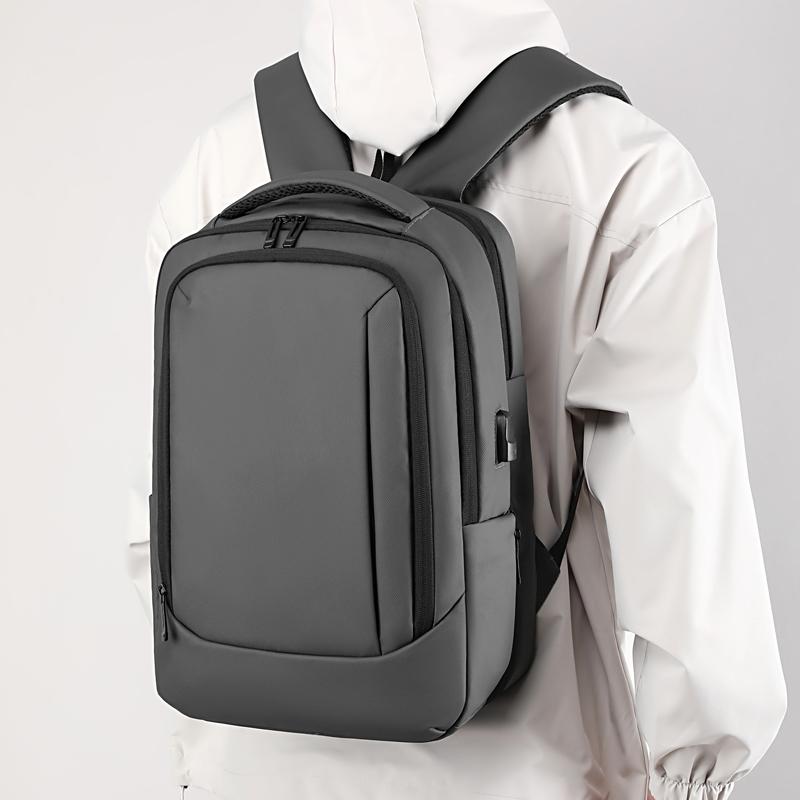 Men's simple backpack,laptop compartment,USB charging port, retractable design, large capacity, lightweight, commuter travel bag