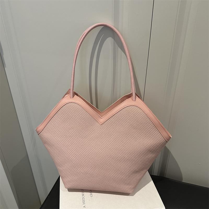 

Premium texture niche large capacity design tote bag summer new shoulder armpit bag versatile commuter рожевий