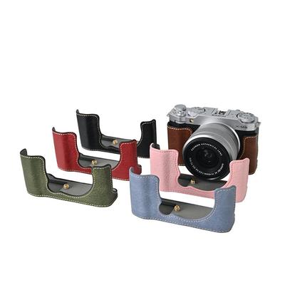 Funda de piel sintética para cámara Fujifilm XM5, tapa inferior para la batería, con correa para el hombro.