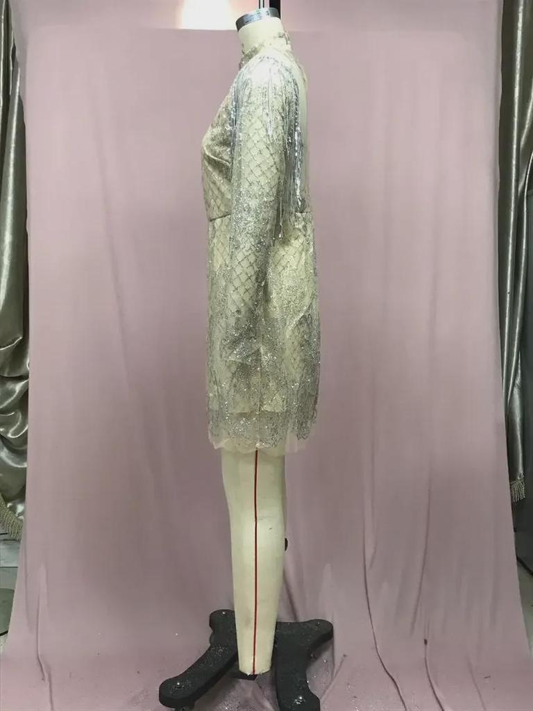 2025 Summer European & American Women's Gold-Accented Backless Transparent Miniskirt