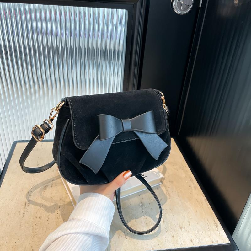 

Сумка на одно плечо из полиуретана с бантом