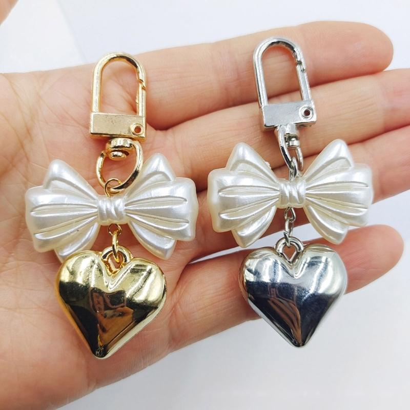 Schlüsselanhänger mit Herzanhänger und Schleife, Handy-Anhänger, abnehmbares Handy-Lanyard, handgefertigt, stilvoller Schmuck für Geldbörse und Tasche
