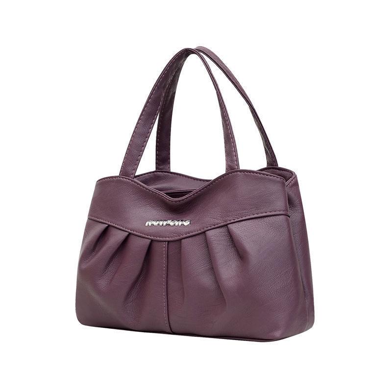 A Lady Commutes To and From Work with Her Mother's Bag In Hand