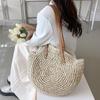 Bolso de verano, ideal para la playa o para viajes, hecha de paja trenzada y tejida, forma circular, buen espacio de almacenamiento