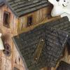 Halloween Light-Up House Ornament, Resin Building with White Figures and Gourd Motifs for Seasonal Display Scenes