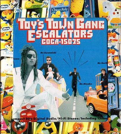 

CD ESCALATORS - Toy s Town Gans COCA15075 TRIAD 1998 Japan Rock Used