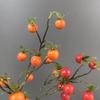 Konstgren med mini persimonblommor för heminredning