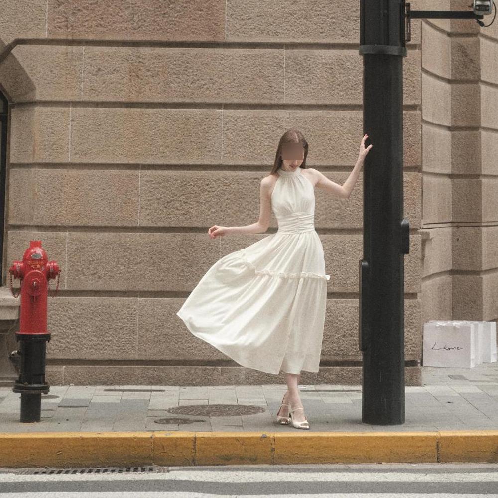 Sleeveless vest neck sling dress seaside vacation thin temperament French long dress women's summer leisure new