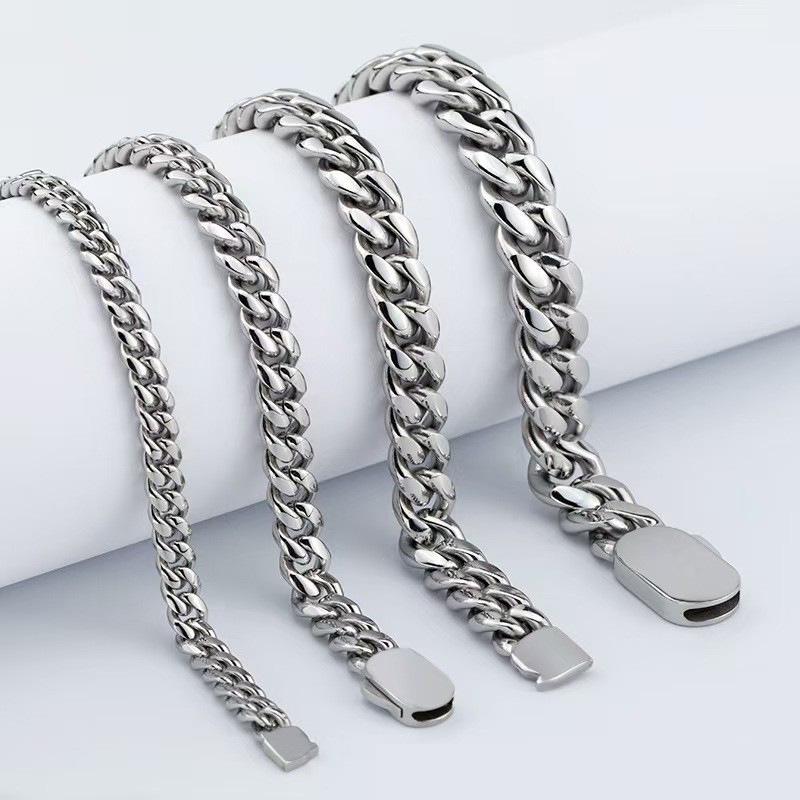 Coastal European & American 18K Gold Necklace & Bracelet Set: Stainless Steel Cuban Chain with Oval Buckle