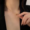 2024 Gold Ball Titanium Steel Necklace: Light Luxury Niche Clavicle Chain with Women's Responsive Design Pendant
