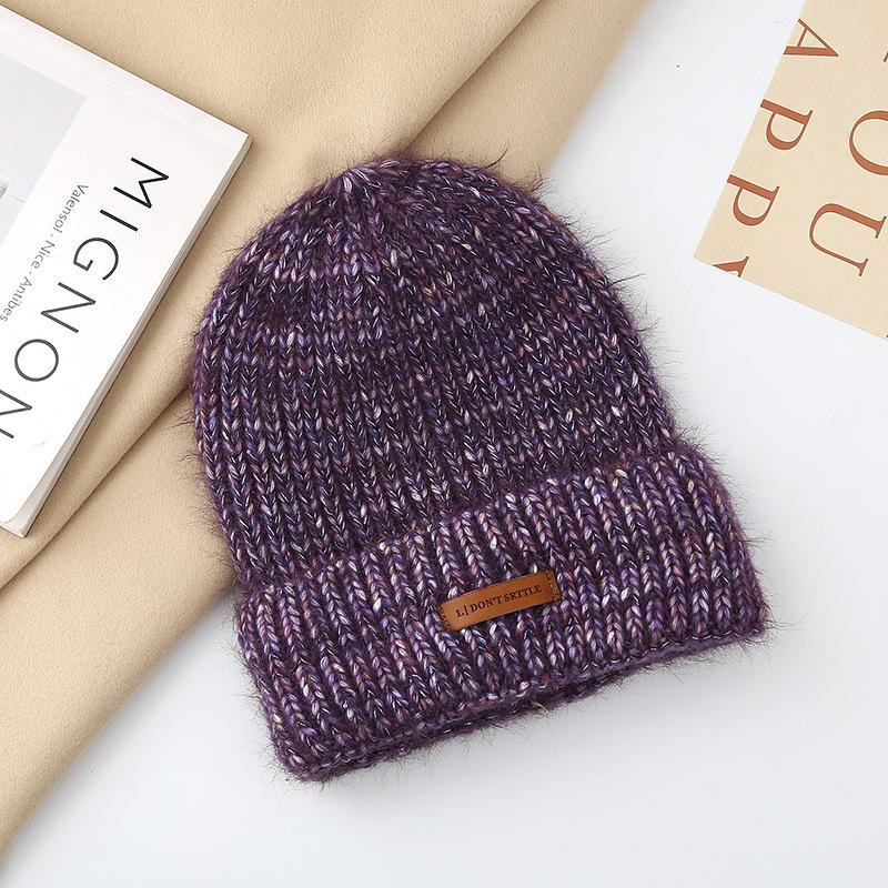 Autumn and winter pullover warm wool hat women's fashion leather label knitted confinement hat outdoor cycling sports hat