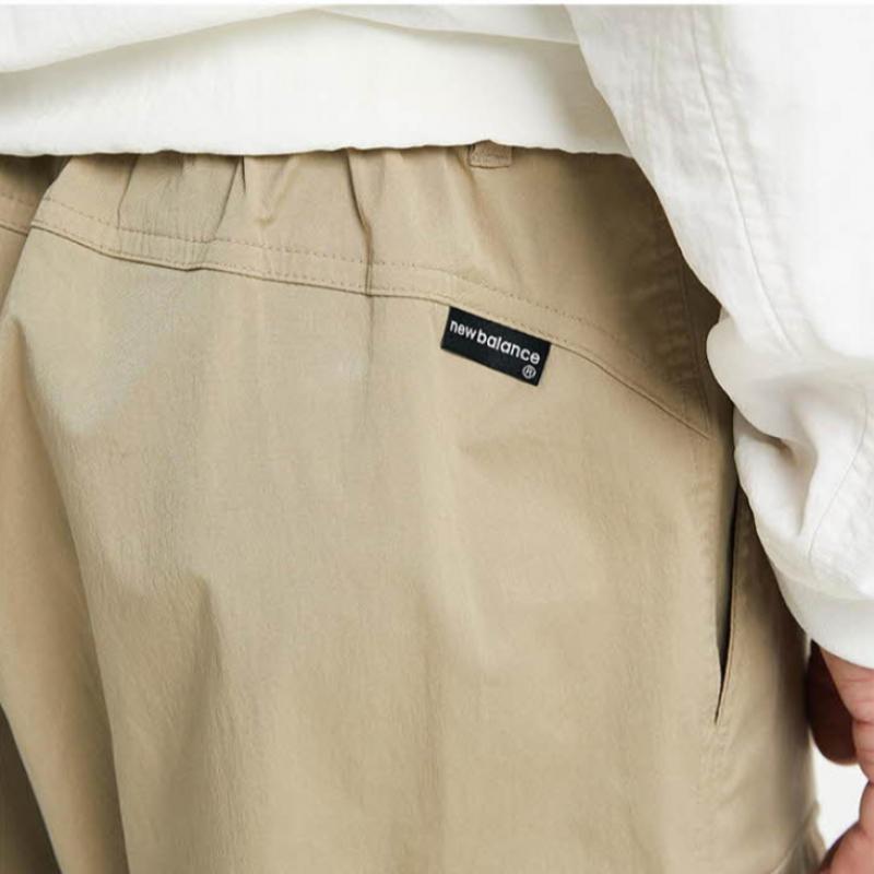 New Balance Pants Lqj Nbntd31013 35 Uni Essential Woven Cargo