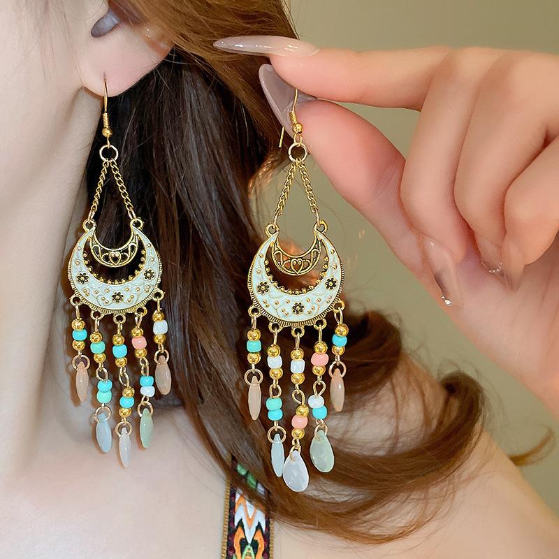 Bohemian ethnic style fringed earrings long niche woven feather earrings new travel wear earrings women