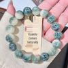 Bodhi Root Six-Character Mantra Beads: Women's Wrap-Around Bracelet for Prayer & Meditation.