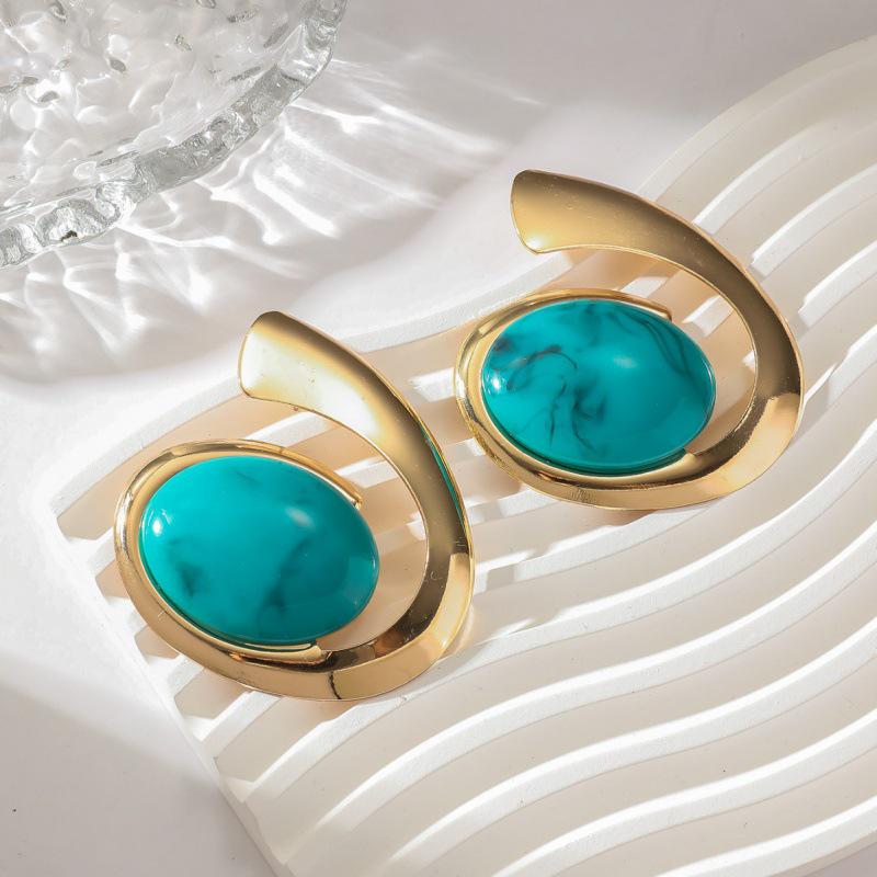 Turquoise Trendy Statement Earrings: Unique Summer Design for a Bold Look.