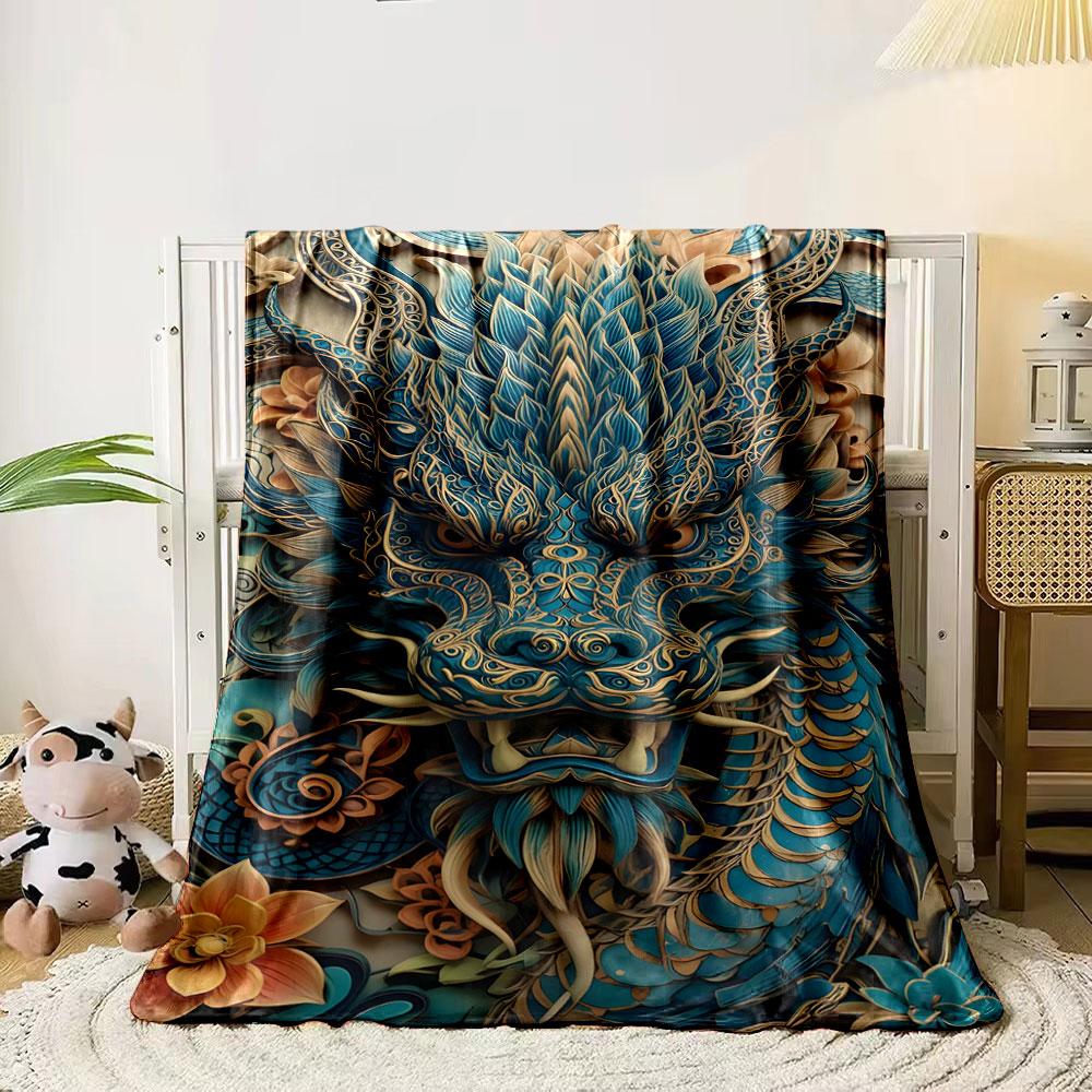 Intricate blue dragon design with detailed scales, flowers, and patterns. for all seasons blanket lunch break throw gift