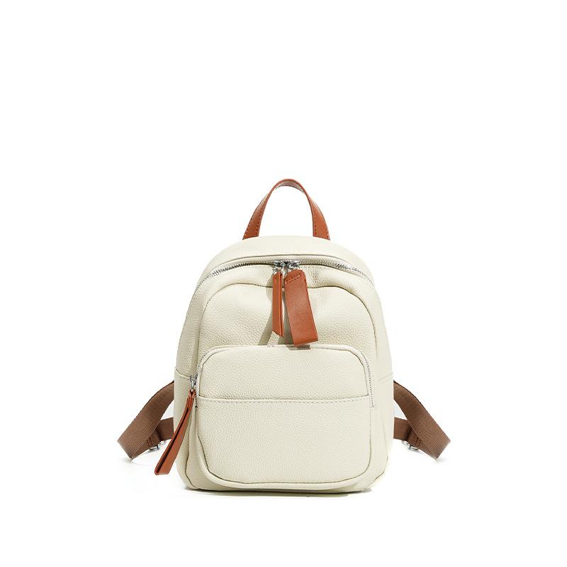 School bag, large-capacity student travel backpack, can hold computer travel, lightweight, high-end leather women's backpack.